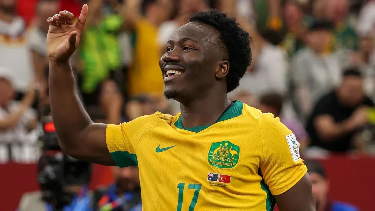 Joueur australien célébrant un but au stade Joueur australien célébrant un but au stade