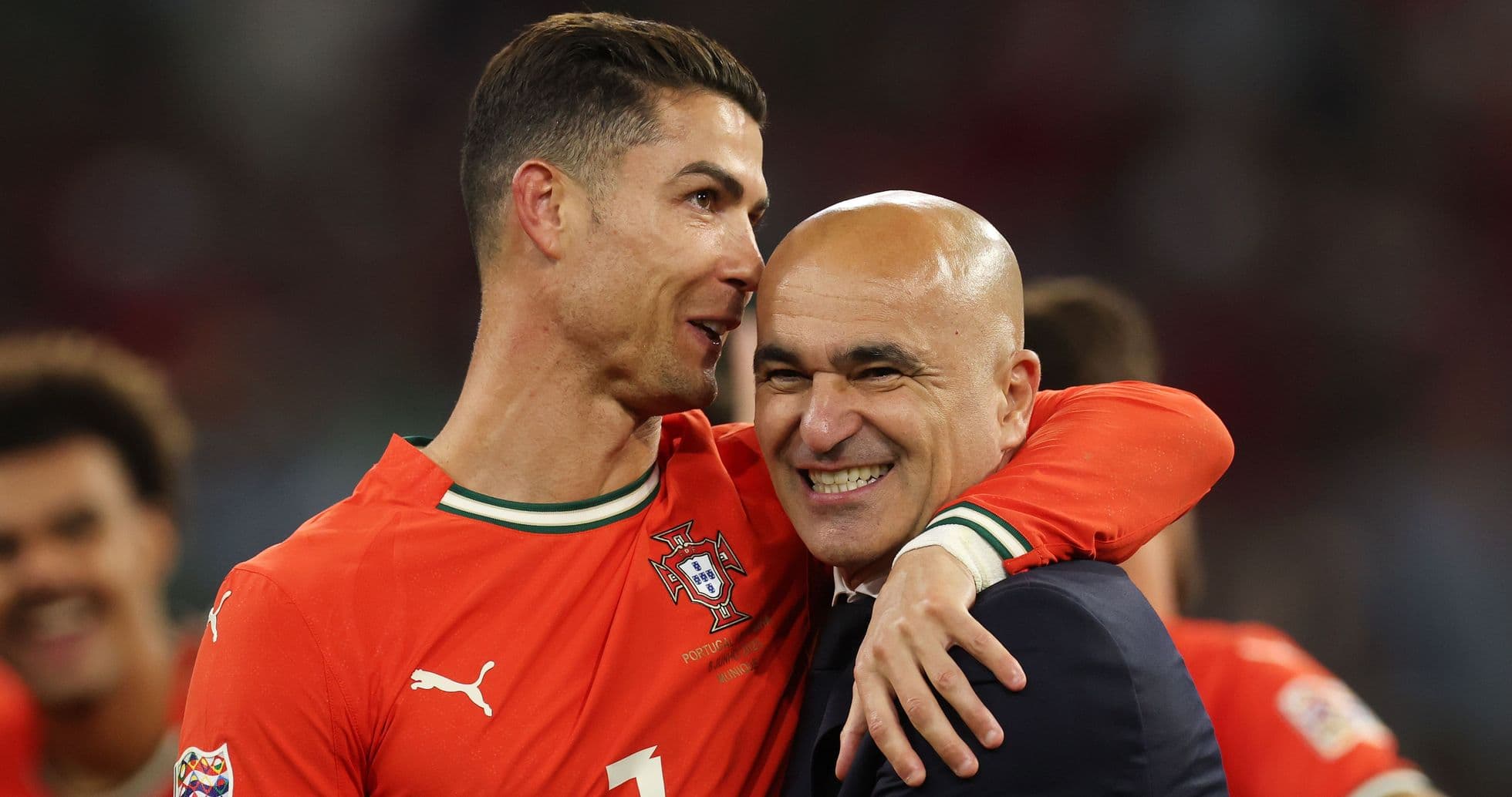 Cristiano Ronaldo and coach celebrating together Cristiano Ronaldo and coach celebrating together