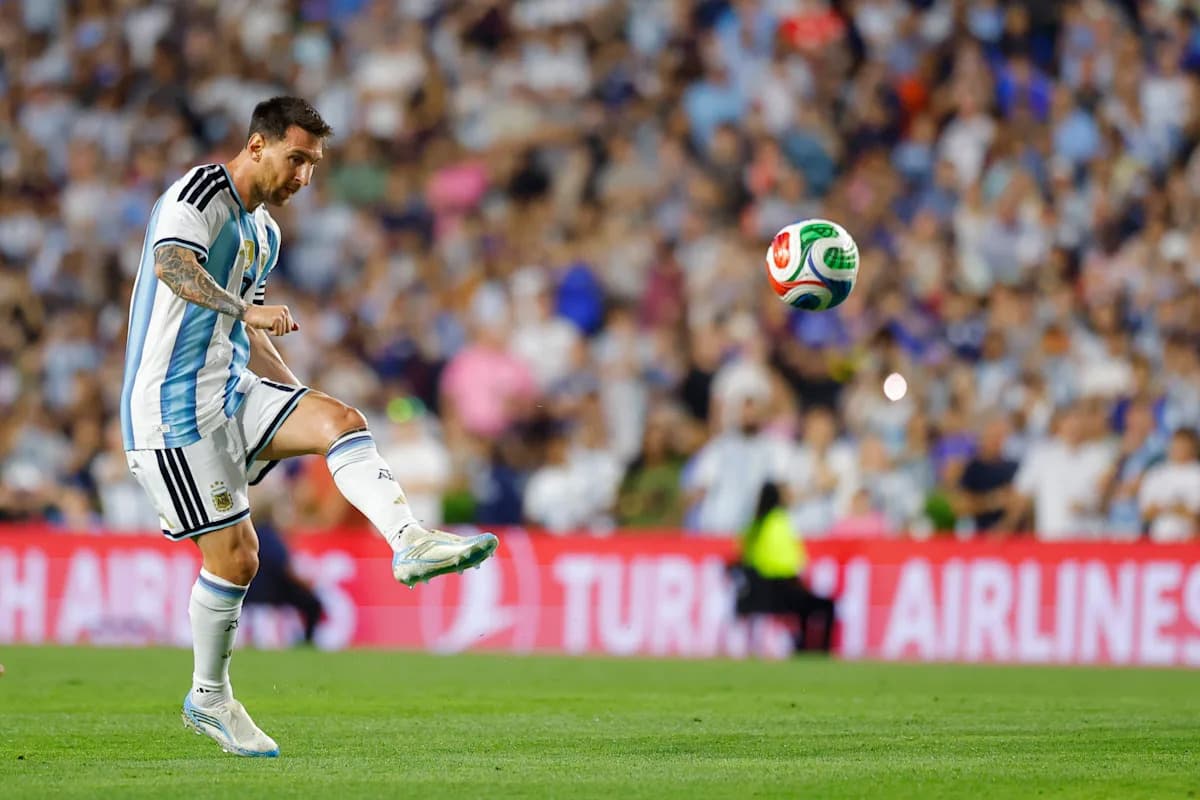 Lionel Messi preparing to kick the soccer ball Lionel Messi preparing to kick the soccer ball