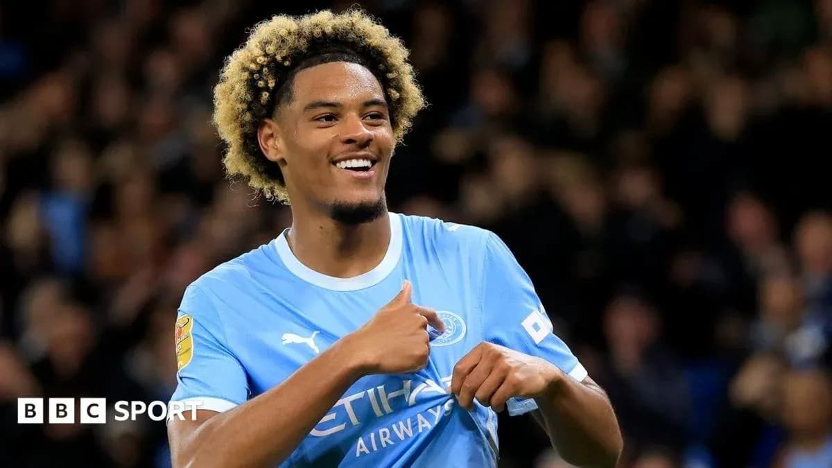 Joueur de Manchester City célébrant un but Joueur de Manchester City célébrant un but