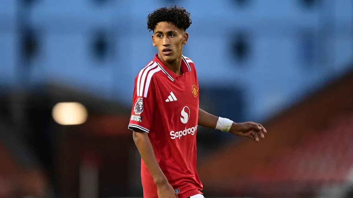 Joueur de Manchester United en action sur le terrain Joueur de Manchester United en action sur le terrain
