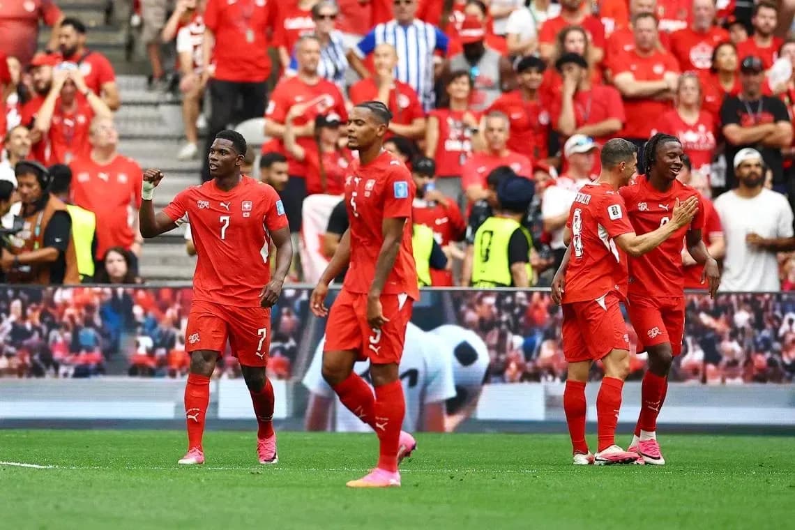 Joueurs suisses célébrant un but lors du match Joueurs suisses célébrant un but lors du match
