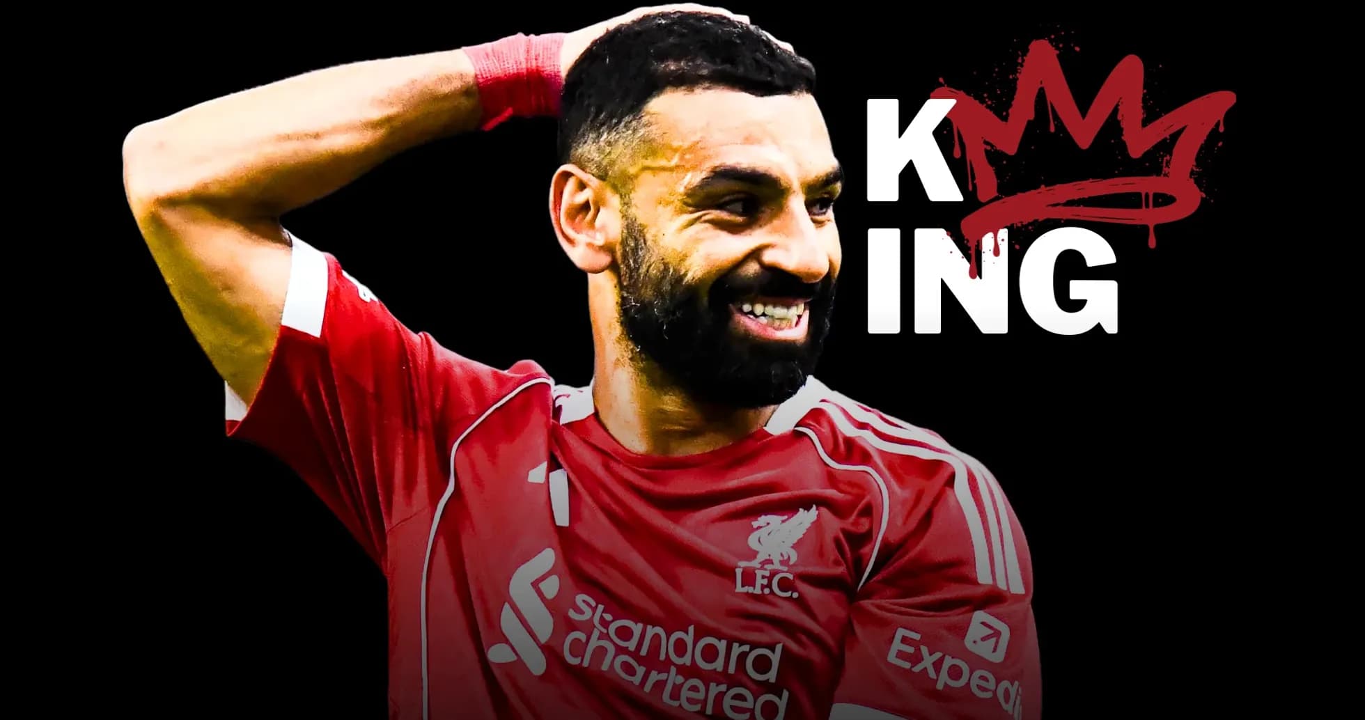 Joueur de Liverpool célébrant avec un sourire Joueur de Liverpool célébrant avec un sourire