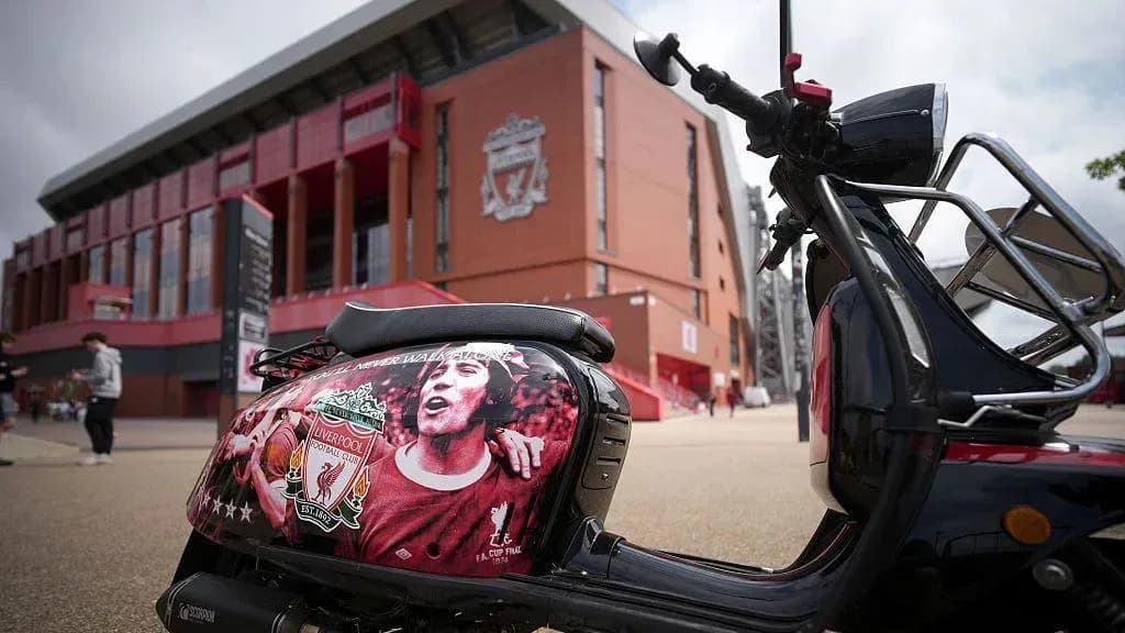 Scooter decorated with Liverpool FC emblem outside stadium Scooter decorated with Liverpool FC emblem outside stadium
