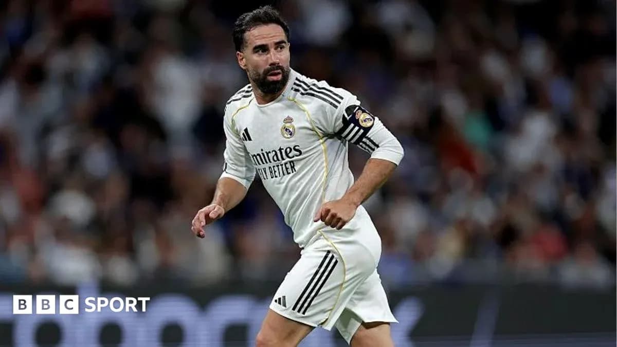 Joueur de Real Madrid en action sur le terrain Joueur de Real Madrid en action sur le terrain