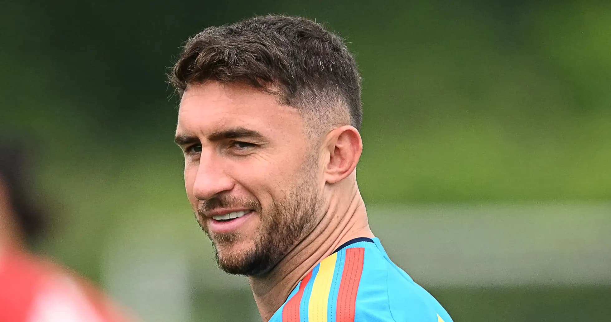 Joueur souriant lors d'une séance d'entraînement Joueur souriant lors d'une séance d'entraînement