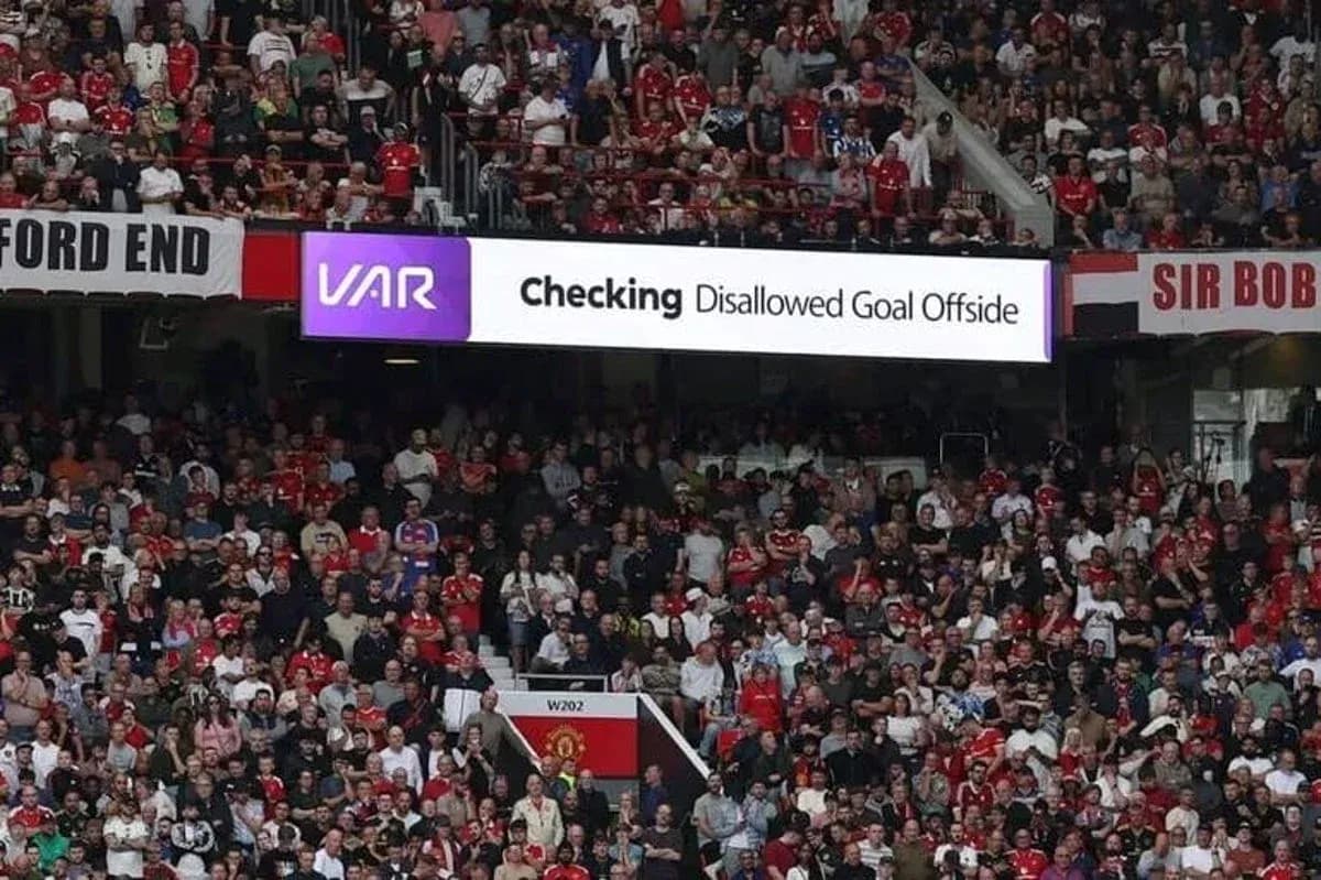 Supporters watching VAR decision on disallowed goal Supporters watching VAR decision on disallowed goal