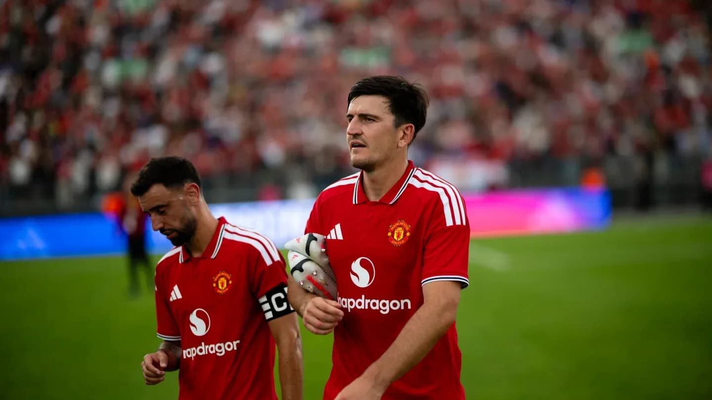 Joueurs de Manchester United quittant le terrain Joueurs de Manchester United quittant le terrain