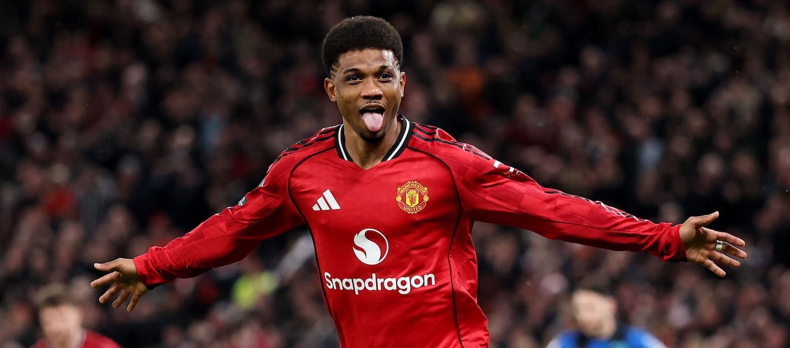 Joueur de Manchester United célébrant un but Joueur de Manchester United célébrant un but