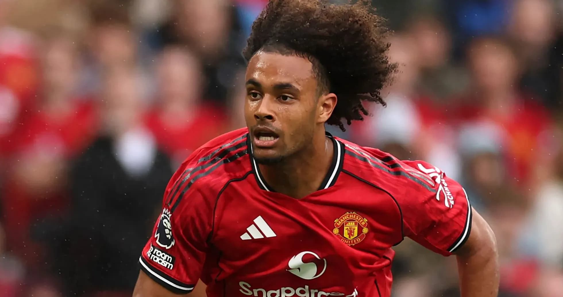 Joueur de Manchester United en action sur le terrain Joueur de Manchester United en action sur le terrain
