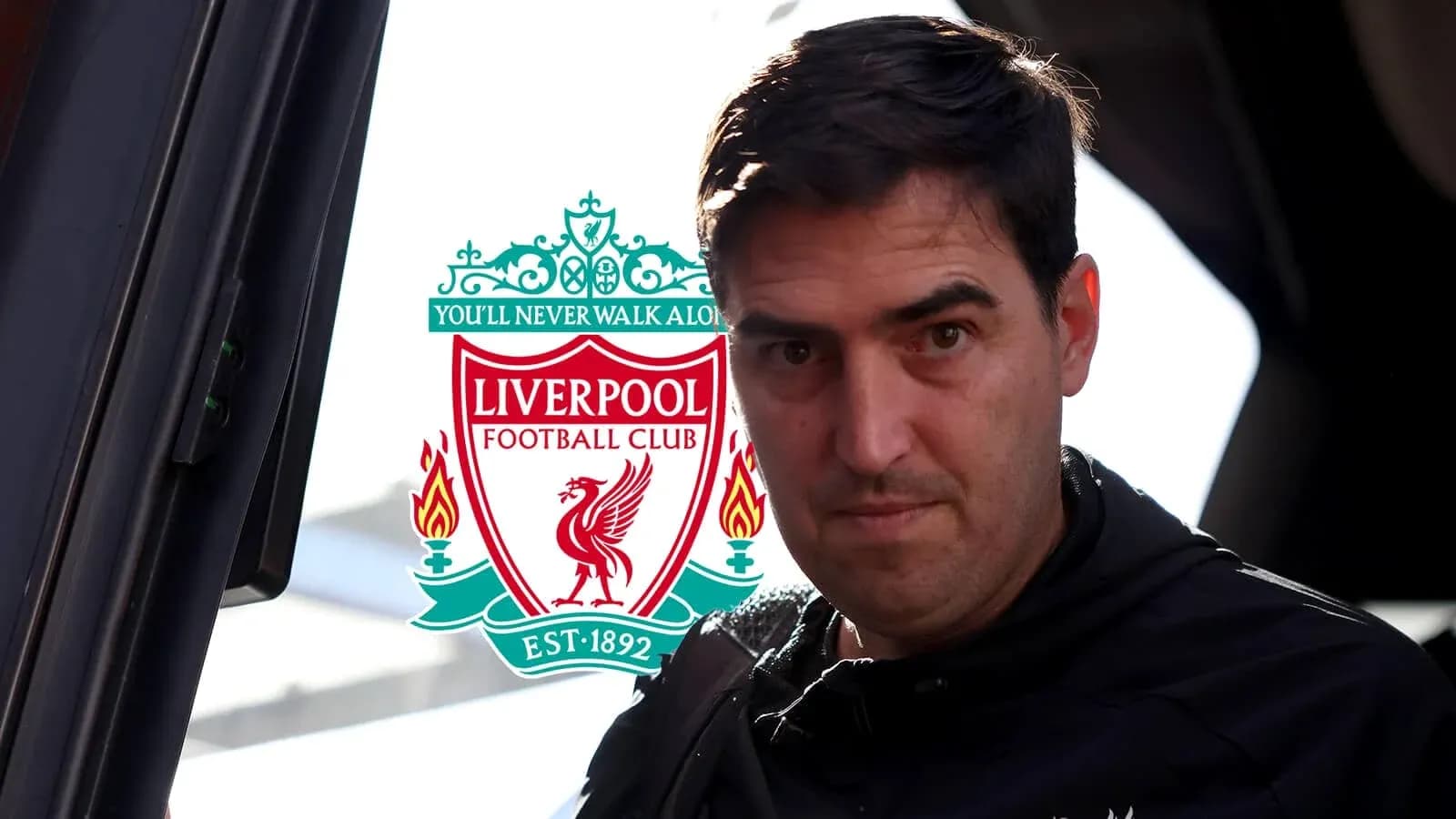 Person near Liverpool FC logo before match Person near Liverpool FC logo before match
