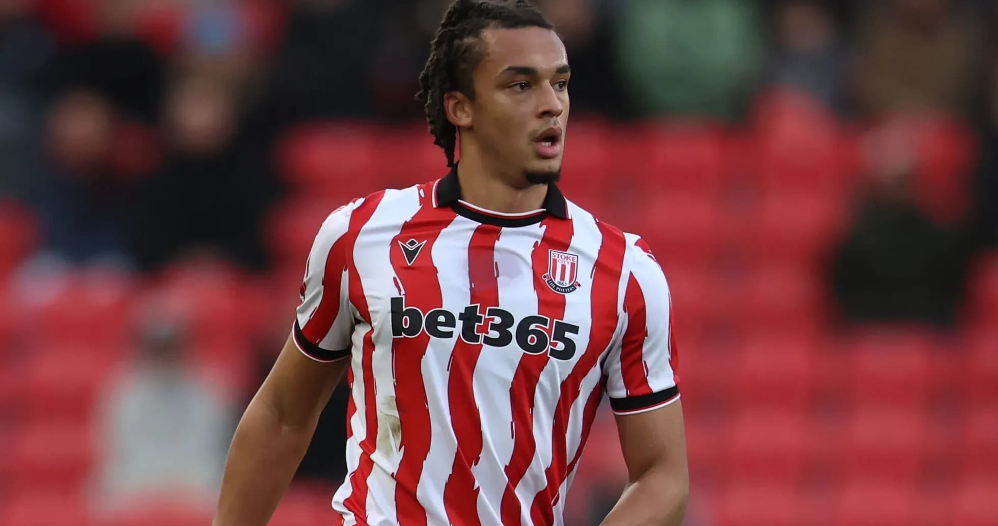 Joueur de Stoke City en action sur le terrain Joueur de Stoke City en action sur le terrain