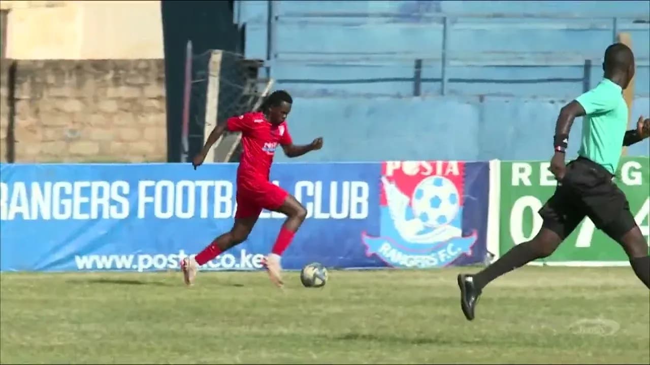 Un joueur de Posta Rangers FC en action Un joueur de Posta Rangers FC en action