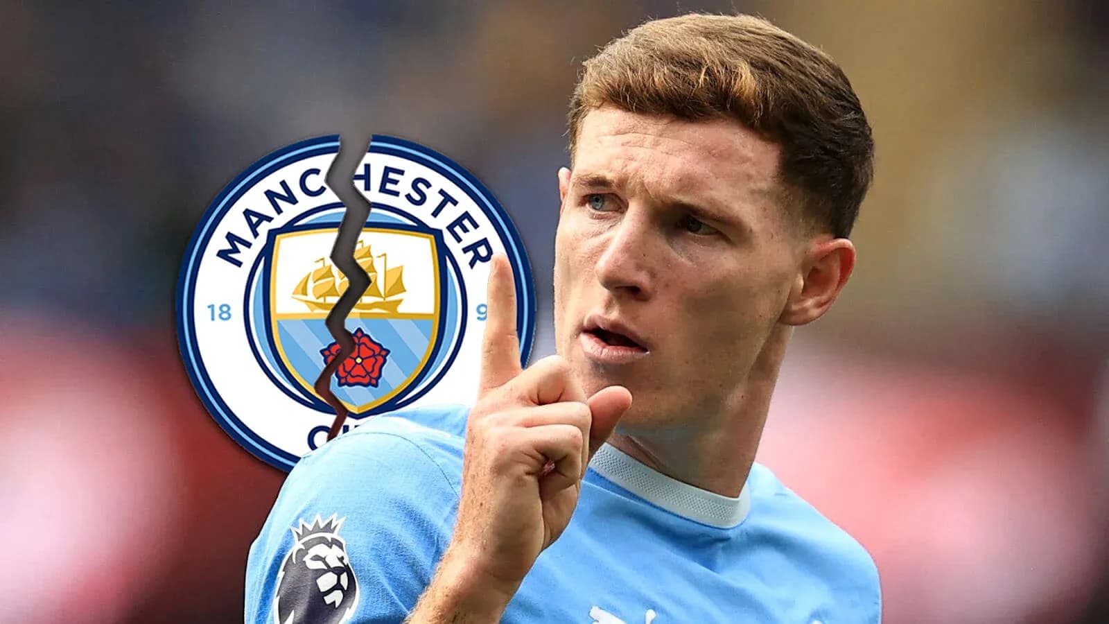 Joueur de Manchester City gesticulant avec le logo du club Joueur de Manchester City gesticulant avec le logo du club