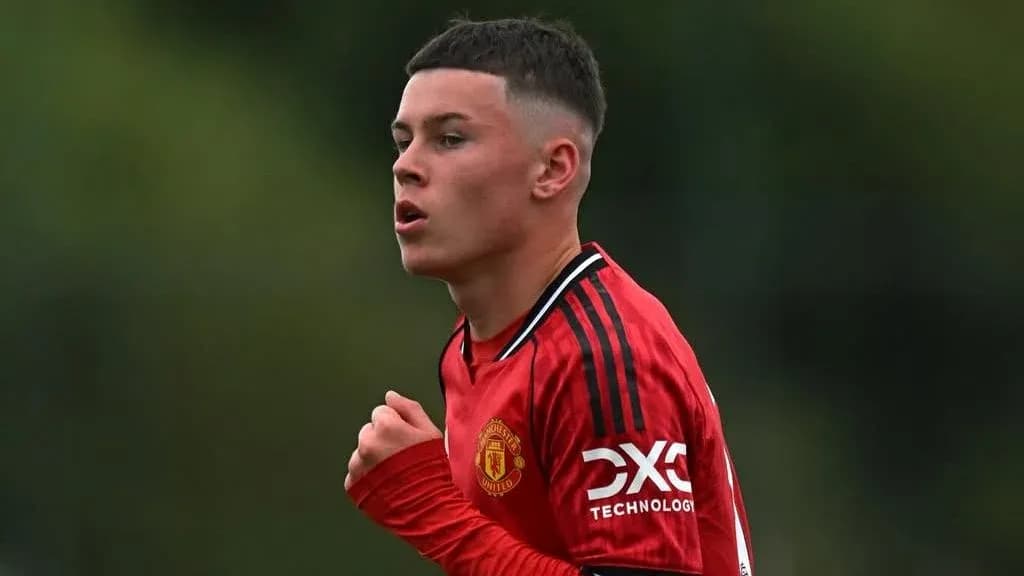 Joueur de Manchester United en action sur le terrain Joueur de Manchester United en action sur le terrain