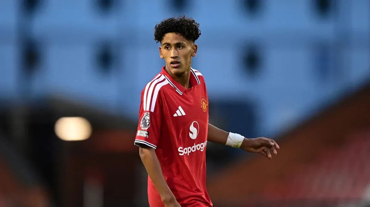 Joueur de Manchester United sur le terrain pendant un match Joueur de Manchester United sur le terrain pendant un match