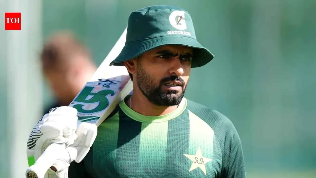 Joueur de cricket portant un chapeau et une batte Joueur de cricket portant un chapeau et une batte