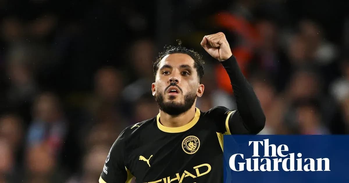 Joueur de Manchester City célébrant un but Joueur de Manchester City célébrant un but