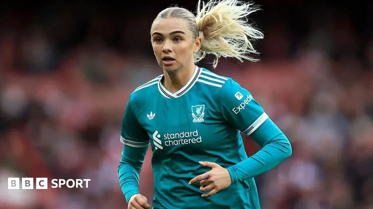 Joueuse de Liverpool en action sur le terrain Joueuse de Liverpool en action sur le terrain
