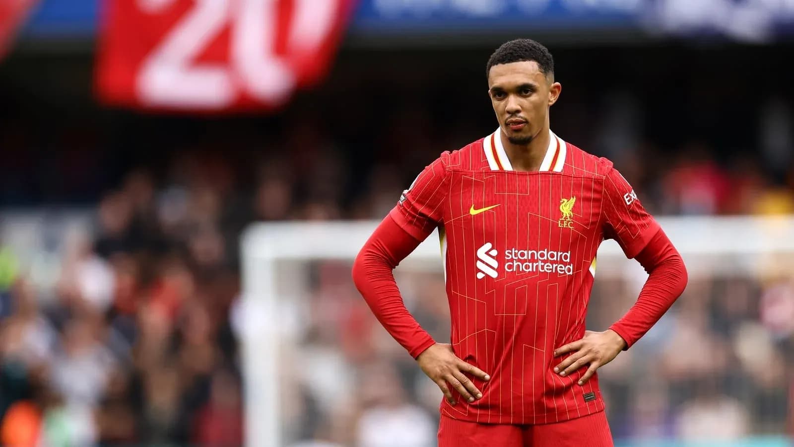 Joueur de Liverpool en action sur le terrain Joueur de Liverpool en action sur le terrain